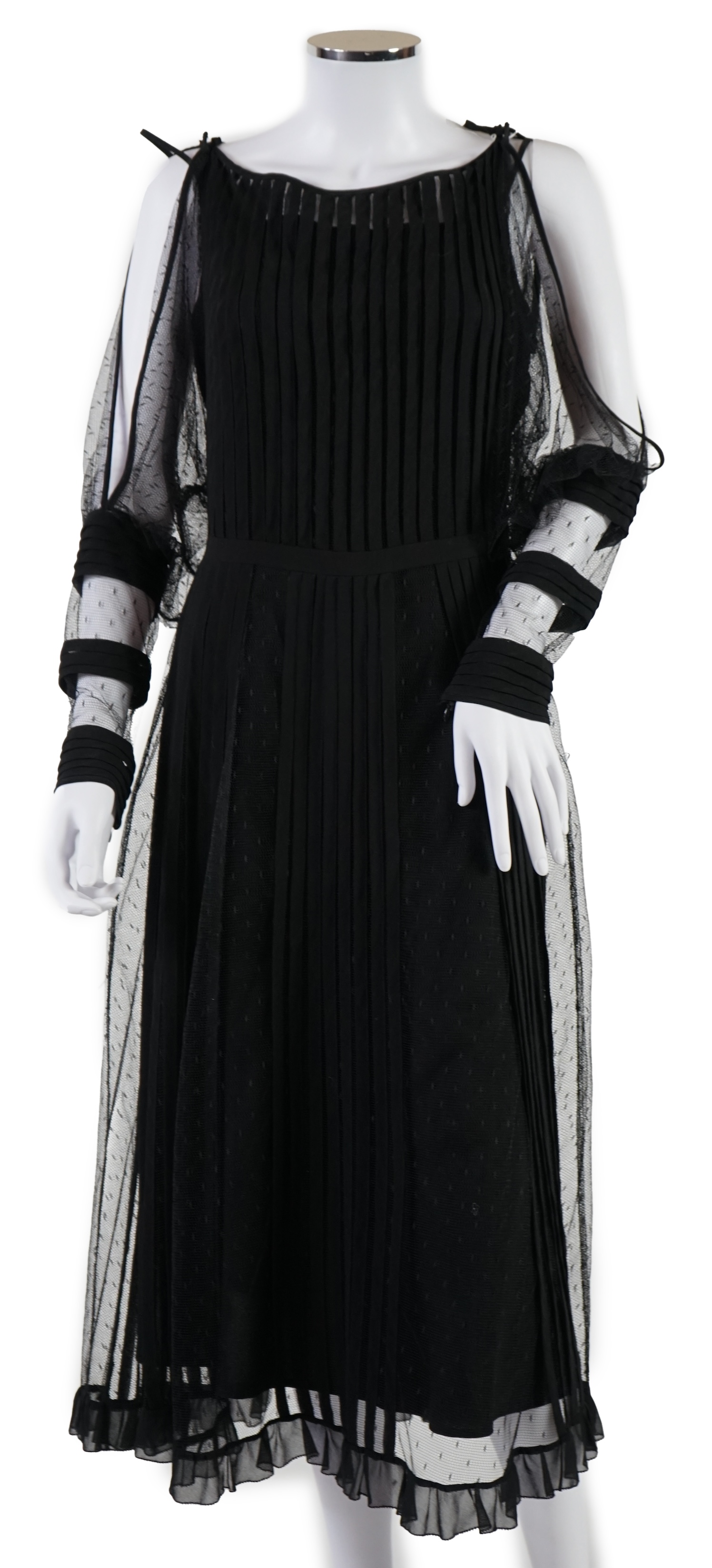 A Red Valentino black lace dress with under slip. Proceeds to Happy Paws Puppy Rescue